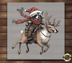 a raccoon riding on the back of a deer wearing a santa claus hat