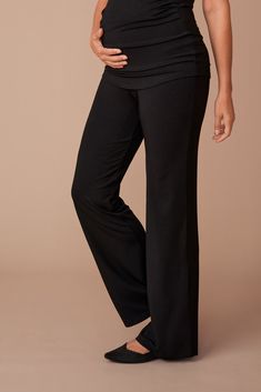 PANTS Our straight legged pants, slim and lengthen your legs for a look that is elegant and easy to wear. They feature a soft and tall waistband, allowing you to adjust its fit by wearing it over your baby bump for a supportive and comfortable over-the-bump style, or folding it down for a more relaxed fit. Complete your look with these pants that go with everything. Combine their flattering wide leg with your best top for a dynamic day, or a fancy blouse for an evening out, but if it’s a day to Straight Legged Pants, Maternity Dress Pants, Maternity Nursing Clothes, Gents Fashion, Fancy Blouse, Bump Style, Best Top, Sustainable Fabric, Fancy Blouses