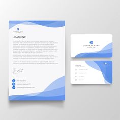 a letterhead, business card and envelope with blue waves on the front cover is shown