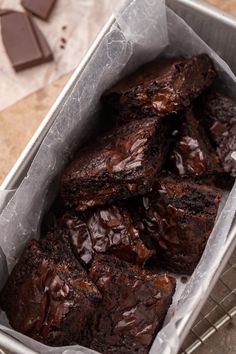 chocolate brownies in a tin on a table