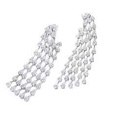 A gorgeous pair of dangle earrings containing 13.69 carats of pear shaped diamonds, set in 18 karat white gold. Diamonds Direct, Diamond Dangle Earrings, Pear Shaped Diamond, Diamond Design, Pear Shape, Pear Shaped, Pear, Dangle Earrings, Diamonds