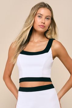 Hearts will be aflutter when you strut through in the Lulus Totally Sensational White Color Block Sleeveless Crop Top! Made from slightly stretchy crepe knit, this flirty little top features a color block-inspired design across a square neckline, princess-seamed bodice, and an ultra-cropped hem. Exposed silver zipper at back. Pair with the matching skirt for a complete look! Fit: This garment fits true to size. Length: Size medium measures 17.5" from shoulder to hem. Bust: Great for any cup size Elastane Camisole Tank Top For Party, Party Elastane Camisole Tank Top, Trendy Sleeveless Elastane Crop Top, Summer Party Tank Top In Elastane, Party Elastane Camisole Tops, Trendy Stretch Sleeveless Crop Top, Trendy Sleeveless Stretch Crop Top, Chic Fitted Sleeveless Crop Top, Spring Sleeveless Elastane Crop Top