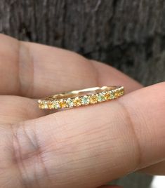 "Alternating Peridot and Citrine Gemstone Full Eternity Band Ring. Material: Solid Gold or PLATINUM Finishing: High Polished/ Shiny Plating: Rhodium/ Platinum Family (if White Gold) Fit: Standard Width: 2mm Height: 2mm Setting Type: U Micro Pave Set (Reminds the Letter \"U\" from sides) Stone: Natural Peridot & Citrine Quality: AAA Shape & Cut: Round, Diamond Cut Total Carat Weight: apx 1+ carat These Rings are Full of Elegance and Beauty. They are so Simple and so Complete at the same t Stackable Peridot Wedding Jewelry, Yellow Gold Peridot Stackable Rings For Wedding, Yellow Stackable Jewelry, Yellow Sapphire Jewelry With Prong Setting For Wedding, Wedding Rings With Yellow Sapphire Birthstone, Yellow Multi-stone Wedding Jewelry, Yellow Multi-stone Jewelry For Wedding, Yellow Peridot Wedding Rings, Yellow Peridot Wedding Jewelry