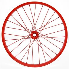 a red bicycle wheel with spokes on it's side, against a white background