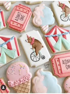 some decorated cookies are sitting on a table