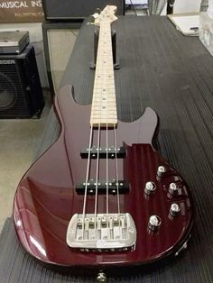 an electric guitar sitting on top of a table