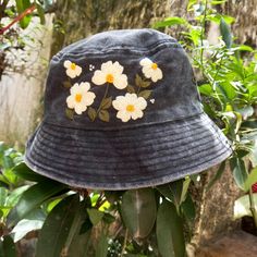 ❤ Flower hand embroidered bucket hat for girl/petite woman. -> Material: jean bucket hat, hand embroidery. -> one bucket hat with adjustable inside strap. (head size: 52 cm - 20.5 inches) -> lovely hand-embroidered flower motifs.    This hat is perfect for everyday wear. Give yourself or someone you love this as a meaningful gift.  With meticulous and delicate hand-embroidered motifs, it makes you look more outstanding and beautiful. It is suitable for going out, going to school,... ❤ Washing in Embroidered Cotton Hat As Gift, Spring Bucket Hat As Gift, Spring Bucket Hat For Gift, Spring Bucket Hat Gift, Bucket Hat For Spring Gift, Handmade Cotton Hats As Gifts, Handmade Whimsical Bucket Hat For Spring, Whimsical Handmade Bucket Hat For Spring, Handmade Casual Mini Hats For Spring