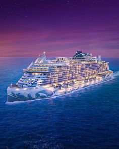 a large cruise ship in the ocean at night