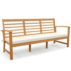 a wooden bench with white cushions on it's back end and armrests