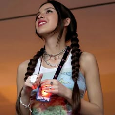 a young woman holding a bag and smiling