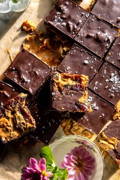 chocolate bars and flowers on a table