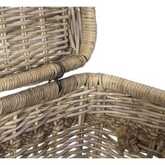 two wicker chairs sitting next to each other