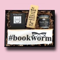 the book worm gift box is packed with books, coffee and other things to read