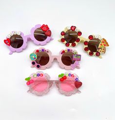 "VALENTINE'S SUNNIES!! These are so adorable-- Each pair is handcrafted by me. Using various beads, Charms, Rhinestones, and fun details! 💘 *4 options available-- Choose your style: 1. I LOVE YOU CHERRY MUCH 2. I LOVE YOU TO PIZZAS 3. LOVE STRUCK 4. XOXO * Anti-Glare * UV Protection (UVA & UVB) * Durable and shatterproof * They open and close smoothly * Each item is made to order and will be ready to ship in 5-7 business days! If you need your order sooner. Please check out my \"RUSH ORDER OPTI Playful Personalized Pink Sunglasses, Cute Customizable Sunglasses For Gift, Cute Customizable Plastic Sunglasses, Fun Sunglasses With Uv Protection For Gift, Fun Sunglasses With Gradient Lenses For Gift, Fun Sunglasses With Uv Protection As Gift, Cute Red Sunglasses With Uv Protection, Playful Summer Sunglasses As A Gift, Fun Sunglasses For Valentine's Day Gift