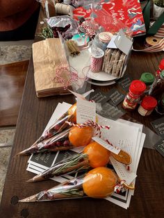 a table topped with lots of different types of food and condiments on top of it