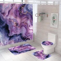 the bathroom is decorated with purple and blue marble designs on the floor, along with matching rugs