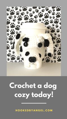 a crocheted dog's head is shown in front of a black and white background