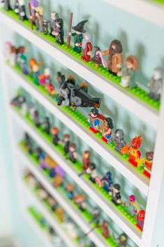 there are many toy figurines on the shelves