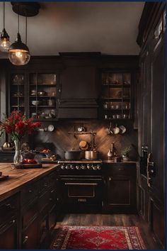 a kitchen with dark wood cabinets and an area rug on the floor that has red flowers in it