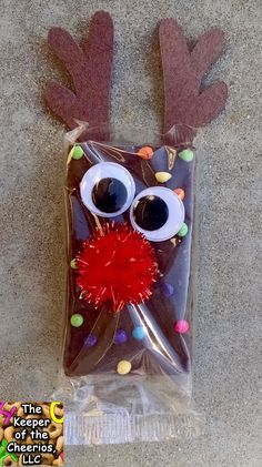 a bag with some fake reindeer's eyes on it