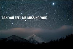 the words can you feel me missing you? on a night sky with mountains in the background