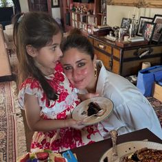 Soha Ali Khan shares a warm bond with her bhabhi, Kareena Kapoor Khan, and the family always tries to stay away from the gossip. However, when Soha shared glimpses of their Eid celebration and her one picture, wherein she had cropped her bhabhi, Kareena left many wondering if everything was okay between the family. Now, Soha shared a special picture with Kareena and her daughter, Inaaya, and it was the highlight of the day.    Soha Ali Khan shared Kareena and Inaaya's picture together... Highlight Of The Day, Eid Pics, Eid Celebration, Hug From Behind, Vivek Oberoi, Black Pantsuit, Soha Ali Khan, Taimur Ali Khan, Kids Stealing