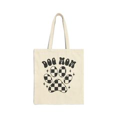 a tote bag with a dog mom paw on it