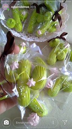 there are some green cookies wrapped in plastic