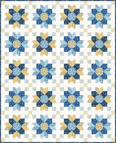 a blue and yellow quilt with flowers on the front, along with a white background