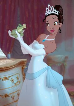 the princess and the frog is holding a frog in her hand while standing next to a dresser