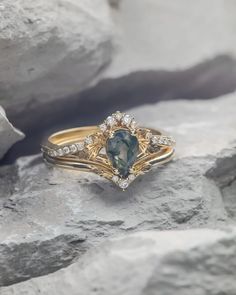 a close up of a ring on a rock