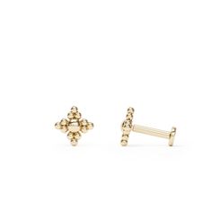 two gold studs with small balls on each side and one smaller bead in the middle