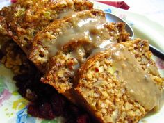 three pieces of bread on a plate with gravy