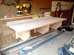 the workbench is being built and ready to be used as a workshop bench