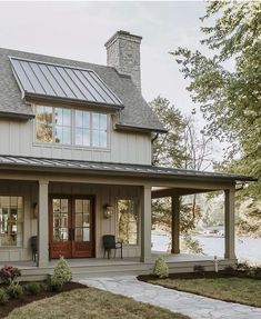 a house with a porch and covered patio