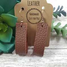 These soft leather rectangle strip hoop style earrings are perfect for you! They have a beautiful sleek look and feel to them. They are easy to wear and lightweight. Includes the rubber backs (not pictured), so that you can wear them without losing them! Fishhook material: copper color = nickel free Check out my other listings: https://www.etsy.com/shop/BethWolfHandmade ----------------------------- CONNECT WITH ME! Website: https://bethwolf.weebly.com Facebook: https://fb.me/bethwolfhandmade In Cowboy Earrings, Western Earrings, Loop Earrings, Style Earrings, Aztec Print, Copper Color, Earrings Photo, Leaf Earrings, Leather Accessories