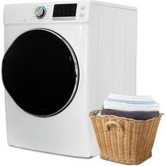 a white washer sitting next to a wicker basket