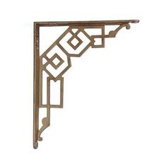 a wooden shelf with an intricate design on it's top and bottom corner, against a white background