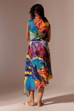 Multicolour abstract print dress with attached waist belt in an asymmetric silhouette. - Aza Fashions Sleeveless Midi Dress With Vibrant Print For Party, Multicolor Sleeveless Dress With Tie Waist, Fitted Multicolor Wrap Dress With Tie Waist, Sleeveless Multicolor Silk Midi Dress, Multicolor Sleeveless Silk Midi Dress, Multicolor Silk Sleeveless Midi Dress, Chic Multicolor Belted Midi Dress, Sleeveless Midi Dress In Multicolor Abstract Print, Sleeveless Midi Dress With Multicolor Abstract Print