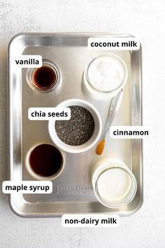 an image of ingredients on a tray for making ice cream or chocolate puddings with milk and sugar