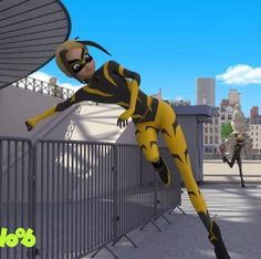 a woman in a yellow and black outfit is doing tricks on a skateboard near a fence