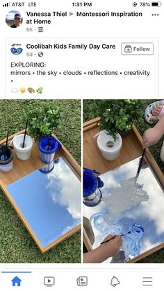 a person painting on a mirrored surface with blue paint and white buckets next to potted plants