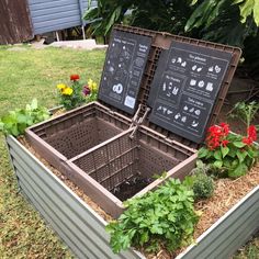 an open box filled with lots of plants