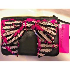 Betsey Johnson Fancy Bow Wristlet Black / White Black Pink Stripe Bow Brand New With Tag Size, Small Approx 7.5" Wide X 5" Tall Pink Floral Lining Inside Sequin Bow, In Colors, Pink, White And Black. Zip Closure Trendy Pink Clutch Wallet, Trendy Pouch Wristlet, Trendy Pink Rectangular Wristlet, Pink Pouch Clutch With Wrist Strap, Pink Clutch With Wrist Strap, Pink Clutch Wristlet, Chic Pink Clutch With Zipper Closure, Black Clutch Wristlet For Gift, Trendy Party Clutch With Zipper Closure