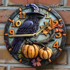 a clock with a crow and pumpkins on it