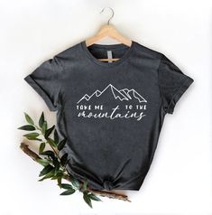 Mountains Trip Shirt,Outdoor Hiking Tee, Adventurer Gift, Take Me To The Mountains Tshirt, Wanderlust Shirt, Camping Squad,Nature Lover Tee HOW TO ORDER 1. From the two Drop-down menus select the Size and the Shirt Color you need. 2. Add these to your cart. *You will need to return to the listing to add the other sizes and designs you need before checking out. 3. After adding all the shirts to the Cart, Checkout them together. DELIVERY & RETURN Order Processing time for Dispatch: 1 working days. ORDER CANCELLATIONS We accept cancellations within 6 hours of placing the order. You can message or email us from your seller account to request cancellation. RETURNS & EXCHANGES Because of the nature of these items, unless they arrive damaged or defective, we can't accept returns for personalized Outdoor Slogan Crew Neck Top, Outdoor Slogan Tops With Crew Neck, Cotton Slogan Tops For Outdoor Activities, Take Me To The Mountains, Mountain Lover, Adventure Gifts, Mountain Tshirt, Mountain Travel, To The Mountains