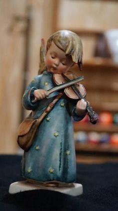 Hummel Figurine Celestial Musician #188 TMK-2 Full Bee Book Value $660.00. Reinhold Unger created this Figurine in 1948, and the one in this size has not been changed since then. The figurine is in mint condition  Sculptor: Reinhold Unger Sculpted: 1948 Made in Germany  Hum 188/I: Height: 6.75" Bee Book, Goebel Hummel, Hummel Figurines, Mint Condition, Sculptor, Collectible Figurines, Musician, Bee, Collectibles