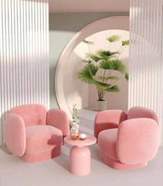 a living room filled with pink furniture and a potted plant