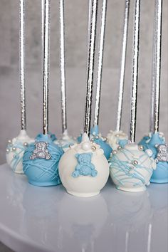 Bear themed baby shower cake pops with blue, white and silver accents! Blue And Silver Baby Shower Ideas Boy, Blue And White Cake Pops, Cake Pops For Baby Shower Boy, Baby Shower Cakepops, Baby Shower Cake Pops Boy, Blue Bear Baby Shower Theme Boy, Cake Pops Blue, Boy Baby Shower Cake Pops, Teddy Bear Baby Shower Cake Boys