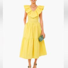 The Ruffle Jo Dress Features A V-Neckline With Flutter Sleeves And A Tiered A-Line Skirt. Breezy And Feminine, This Style Is Versatile For Everything From Picnics In The Park To Special Occasions. Add Wedges And Statement Earrings For An Extra Pop Of Color! V-Neckline Flutter Sleeves Midi Length Tiered A-Line Skirt Care: Hand Wash Cold Water, Lay Flat To Dry **Authentic Hyacinth House From Tuckernuck** V-neck Ruffled Midi Dress For Garden Party, V-neck Ruffle Midi Dress For Garden Party, V-neck Midi Dress With Ruffles For Garden Party, Feminine Yellow V-neck Midi Dress, V-neck Ruffle Dress For Spring Garden Party, V-neck Yellow Dress With Ruffle Hem, V-neck Midi Dress With Ruffles For Daywear, Chic V-neck Ruffle Dress For Daywear, Tuckernuck Dress